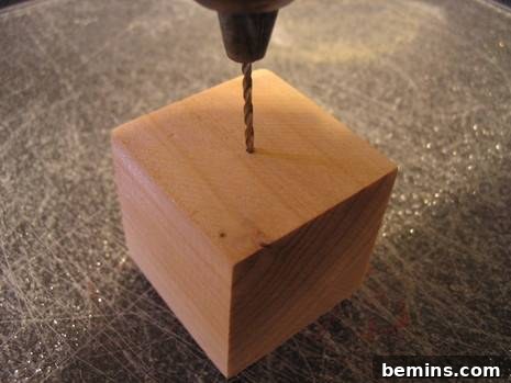 Drilling a hole in a wooden block