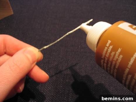 Applying glue to a wire
