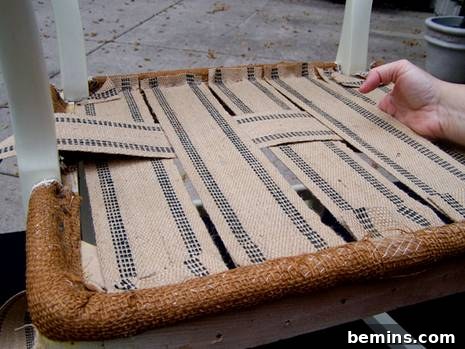 Weaving the jute webbing across the chair seat