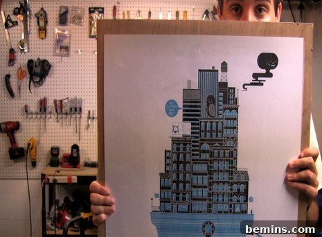 Crafting a Budget-Friendly DIY Poster & Art Frame: Video Guide 2 Close-up of a man holding a framed image of a building, showcasing the details of the DIY picture frame.