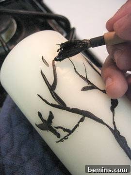 Brush design into candle