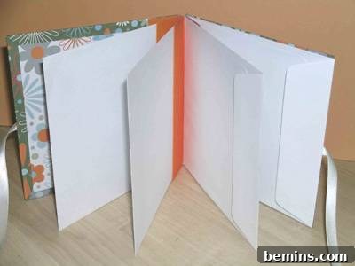 Decorative white envelopes bound together to form a beautiful journal.