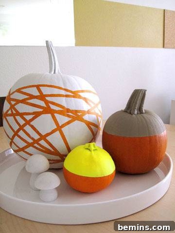 Creative Pumpkin Decorating Ideas: No Carving Required 4 Painted pumpkins with tape designs