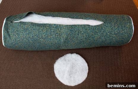 Turn Old Towels into a Cozy Body Pillow 12 Stuffing the towel roll inside