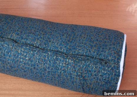 Turn Old Towels into a Cozy Body Pillow 13 Hand-stitching the opening closed