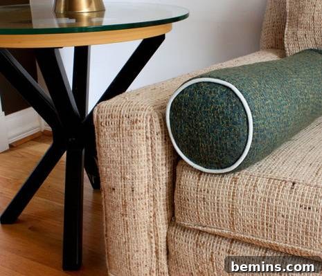 Turn Old Towels into a Cozy Body Pillow 14 Finished bolster pillow on a couch