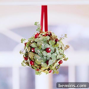 30 Creative Cranberry Decor Ideas 6 An ornament made from different types of leaves and berries, including cranberries.