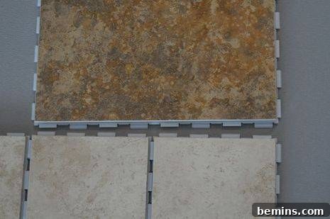 Close-up of SnapStone tiles being installed, showcasing the interlocking tabs.