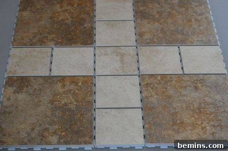 Applying SnapStone Flexible Grout to the tile surface.