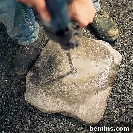 Assembling the river rock fountain