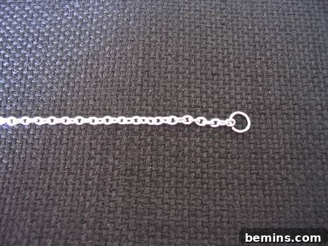 Ornamental, lightweight and white-colored chain.