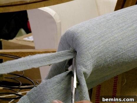 Upholstery Workshop: Mastering Pleated Rolled Arms 6 Adjusting the fabric around the arm