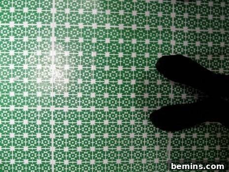 Close-up of DIY Paper Floor with Artistic Pattern and Durable Sealant
