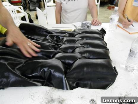 Students gaining invaluable practical experience in traditional leather tufting under master guidance
