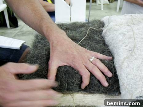 Close-up of expertly crafted bridle stitches locking horsehair stuffing into position