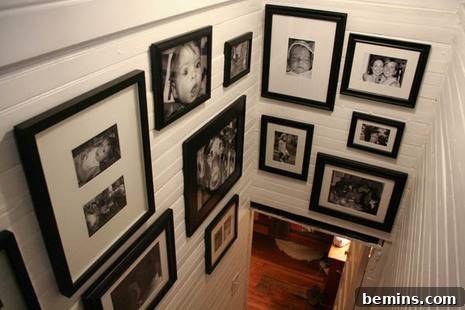 Stairs with Framed Photos Creating a Personalized Gallery Wall