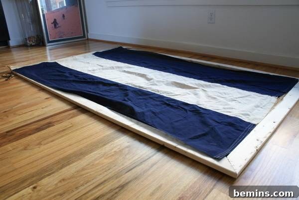 How to Upcycle a Vintage Flag into Stunning Wall Decor 7 Gluing and Stapling