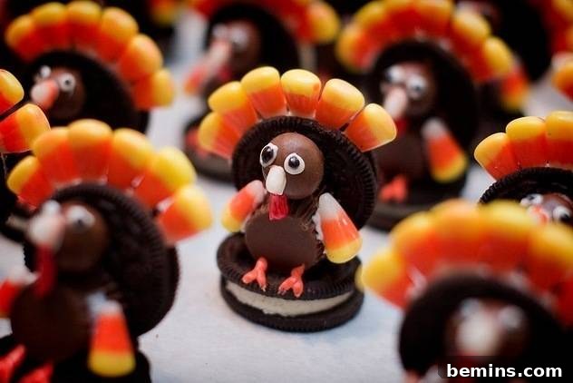 Turkey Time: 8 Delightful Thanksgiving Dishes 3 Oreo cookies decorated with chocolates and candycorn to make a turkey figurine.