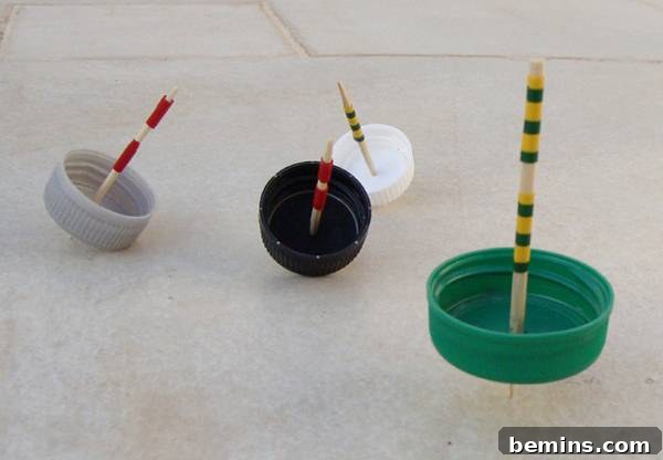 Handcrafted Hanukkah: Dreidel Delights & Dazzling Ideas 3 DIY bottle cap spinning tops for Hanukkah