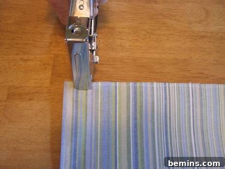 A Fresh Look: DIY Window Treatments for My Craft Room 5 DIY window screen made by using old clothes. Showcasing the resourcefulness of DIY projects.