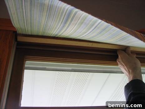 A Fresh Look: DIY Window Treatments for My Craft Room 6 A wooden window with a reaper and glass, hand made in home. The charm of handmade details.