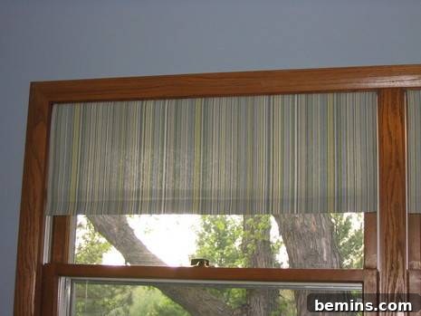 A Fresh Look: DIY Window Treatments for My Craft Room 7 A tree seen through a brown-colored window. The beauty of natural light filtered through custom window treatments.