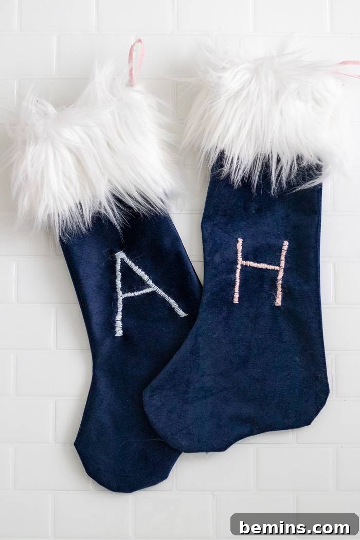 Christmas Stocking Spectacular 9 Blue and white stockings embroidered with the letters A and H.