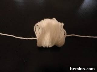 White color yarn to make pom pom flower.