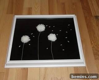 A frame with Pom Pom Flowers