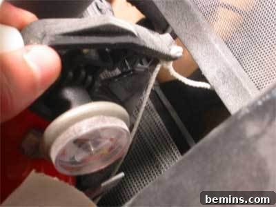 Someone working on a machine operating spindle.