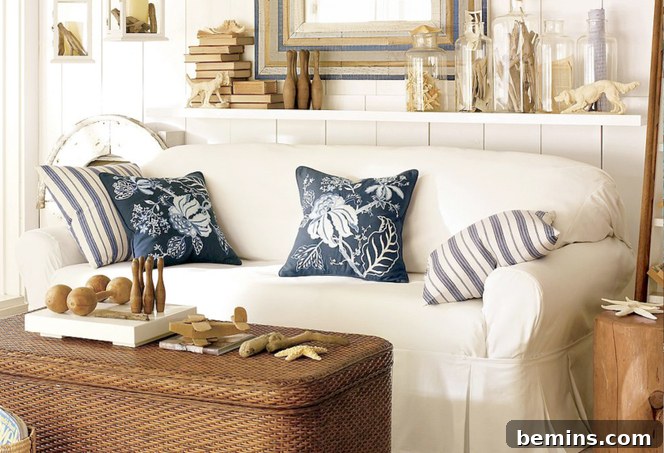 Elegant Pottery Barn setting with cushioned seating and a stylish cabinet table.