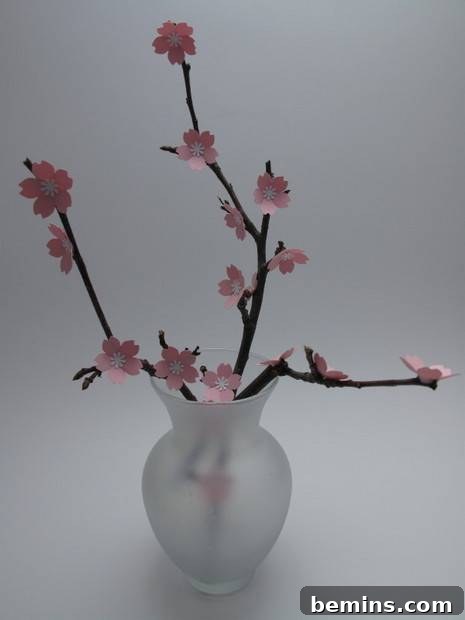 Paper cherry blossom branch