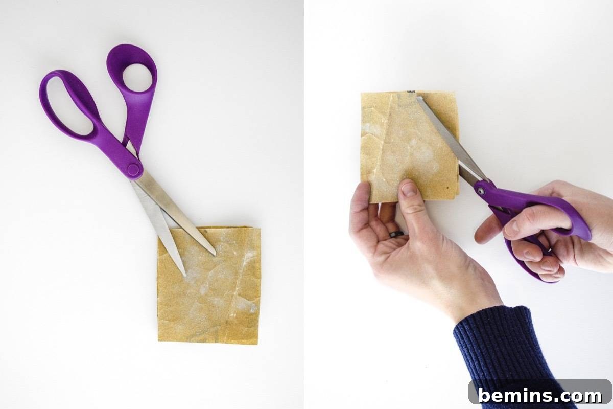 Sharpening scissors at home using sandpaper strips.