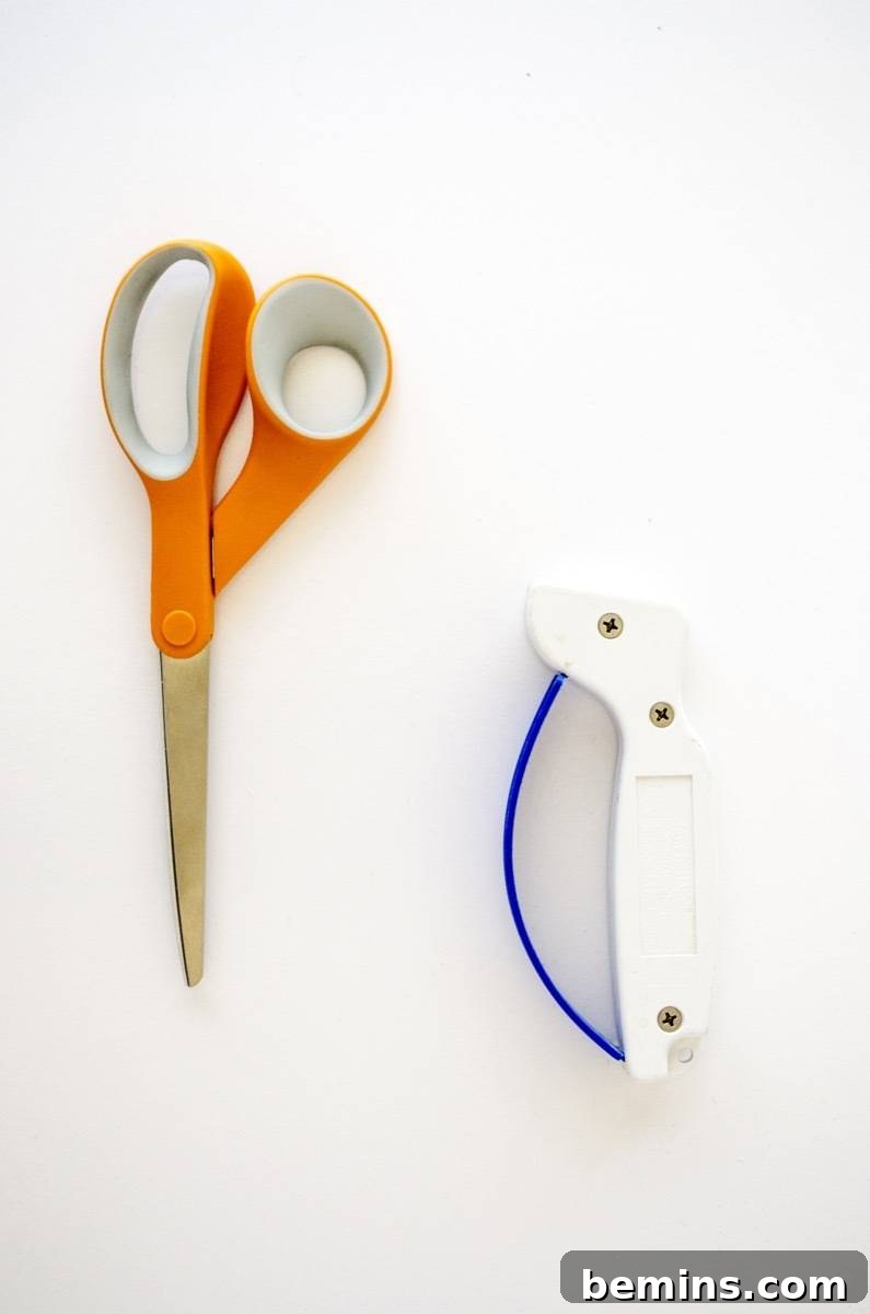 Using a store-bought scissor sharpener for convenient sharpening.