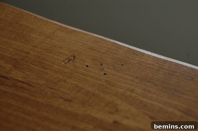 Crafting Character: Unique Rustic Window Trim Ideas 15 Close-up of the stained header