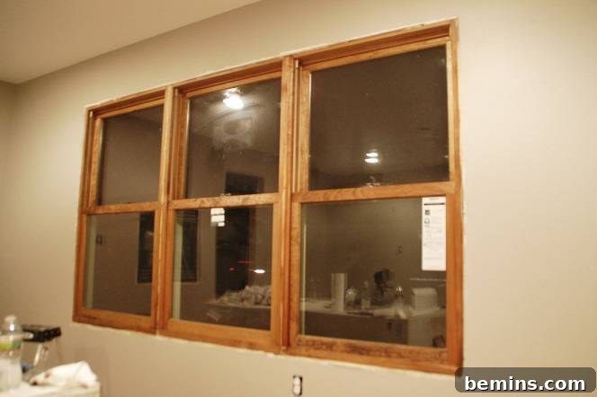 Crafting Character: Unique Rustic Window Trim Ideas 8 Staining the unfinished window