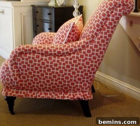 Red color with white design pattern reupholstered chair.