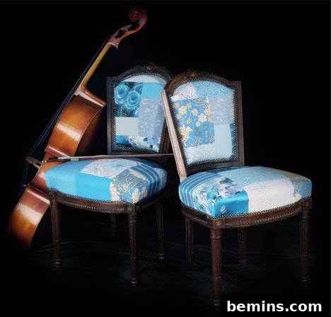 Unlocking the Beauty of Fabric Remnants 4 Two blue color remnant fabric chairs and a wooden violin aside.