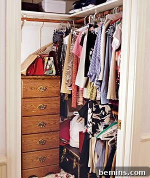 Messy closet before inexpensive organization