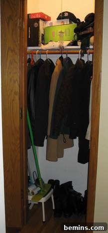 Messy front closet before makeover