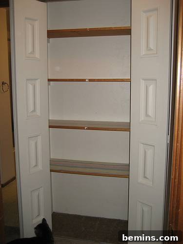 Remove the doors and paint it blue for a closet makeover