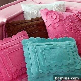 Colorful pillows are in the bed.