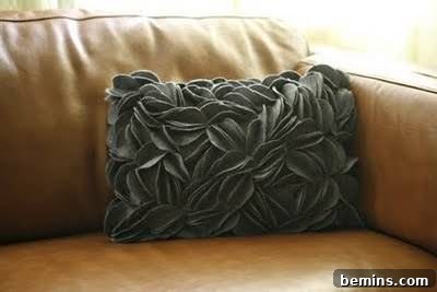 Grey color pillow on sofa.