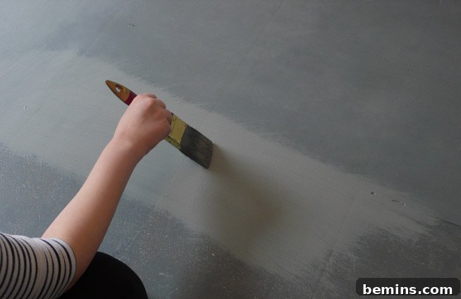 Vinyl flooring before concrete look transformation