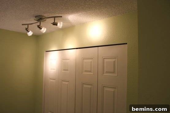 Elegant Newlywed Bedroom Sanctuary Unveiled 12 Modern mirrored closet doors reflecting the bright bedroom space