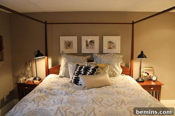 Elegant Newlywed Bedroom Sanctuary Unveiled 15 Bedside table with new Anthropologie knobs and custom jewelry frame