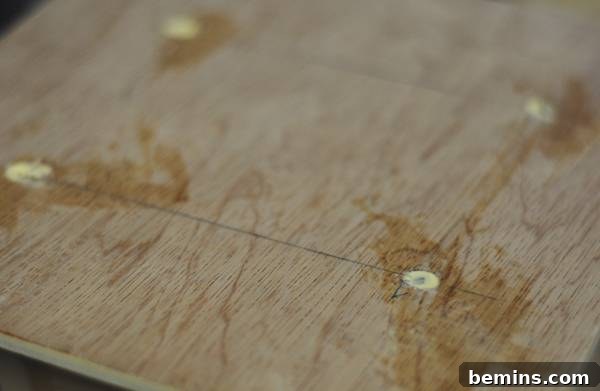 Gluing Dowels to Birdhouse Roof