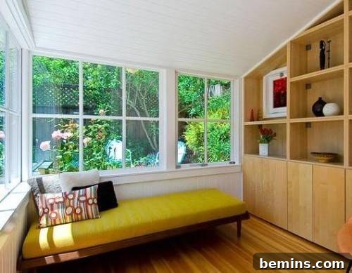 Modern porch with green plants creating a serene and refreshing atmosphere.