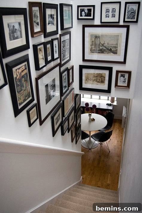 A stylish gallery wall showcasing a variety of art pieces in a well-curated arrangement.