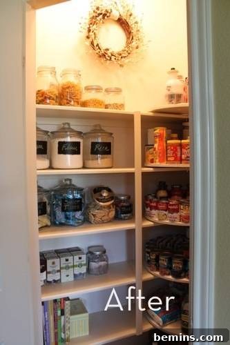 Decor Chick's pantry after makeover, featuring clear organization bins and a large Lazy Susan.